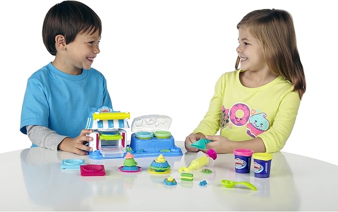 Make a big dose of "delicious" with the Double Desserts Playset. You'll have a sweet tooth for fun when you make pretend cakes and frosting with the Play-Doh modeling compound and softer, smother Play-Doh Plus compound. When you put one of your tasty-looking creations in the oven playset, it will be ready in no time. Then it's time to decorate with pretend frosting and add a couple of scoops of pretend ice cream. Get "baking" and serve your tasty-looking treats to all your friends. Then smash it up and star